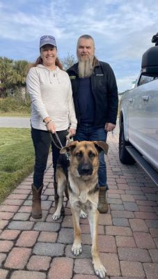 1741
PUPPY RICO WITH NEW MOM MELISSA AND DAD TIM DOPG 1741
