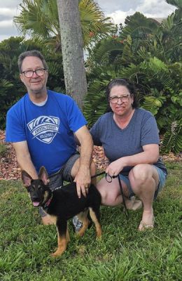 1791
PUPPY RAYLAN WITH NEW DAD SAM AND MOM CHRISTINE DOG 1791

