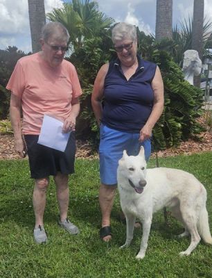 1822
LOBO WITH NEW MOM LAURA AND DAD DENNIS DOG 1822
