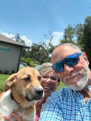 1794
PUPPY RED WITH NEW MOM ANN AND DAD JOHN DOG 1794
