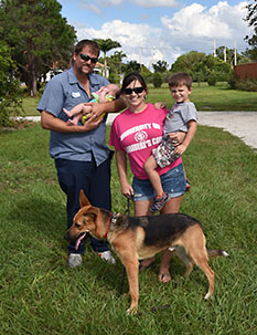 CHARLIE WITH NEW MOM DAD BROTHER AND SISTER ANDY AND BETHANY DOG 618
