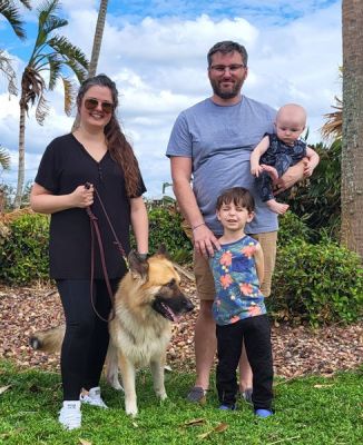 HARRIS WITH NEW MOM BETHANY AND DAD JONATHAN WITH BROS JACKSON AND CAMERON DOG 1372
Keywords: 1372