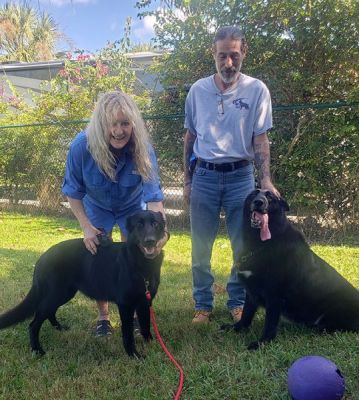 BONNIE AKA TULA WITH NEW MOM CHRISTINE AND DAD ROBERT DOG 1261
Keywords: 1261